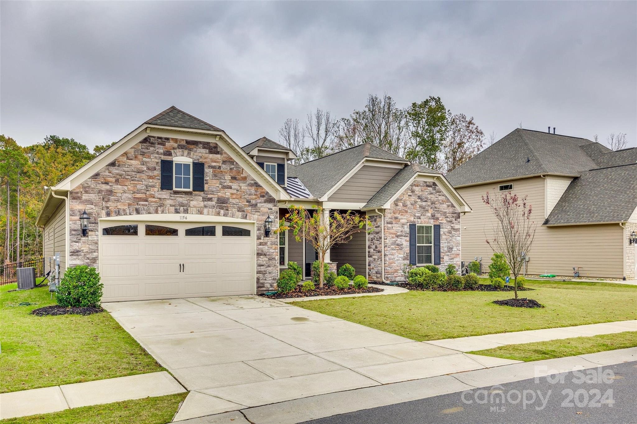 1156 Castle Road Fort Mill, SC 29707 - Photo 2 of 34 a front view of a house with a yard