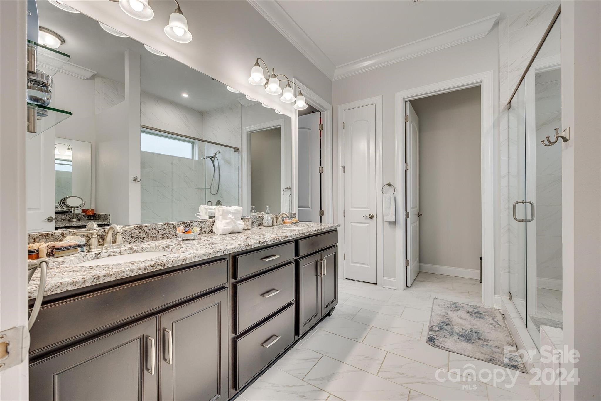 1156 Castle Road Fort Mill, SC 29707 - Photo 26 of 34 a bathroom with a granite countertop sink mirror and shower