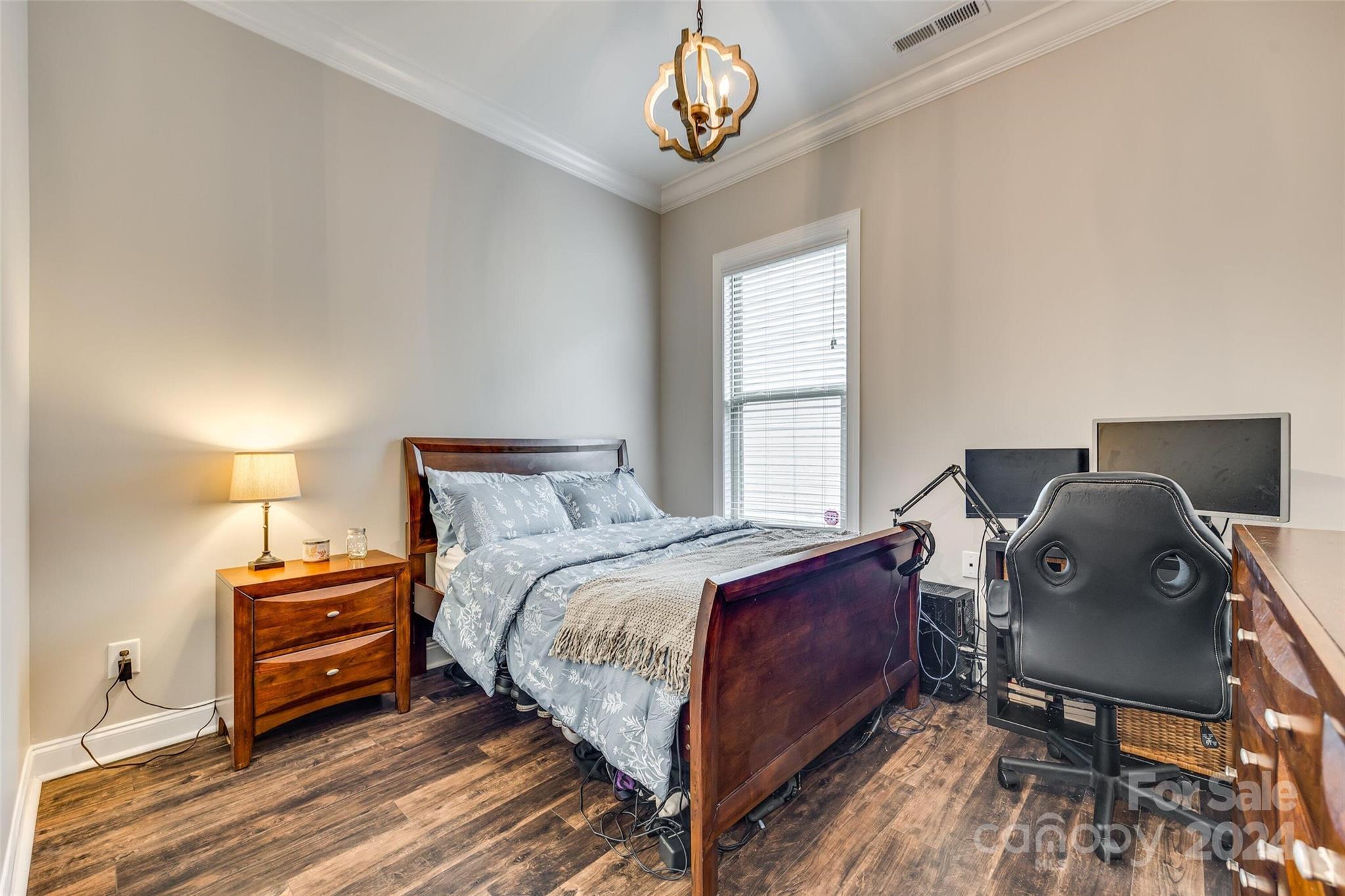 1156 Castle Road Fort Mill, SC 29707 - Photo 32 of 34 a bed room with a bed and a chair