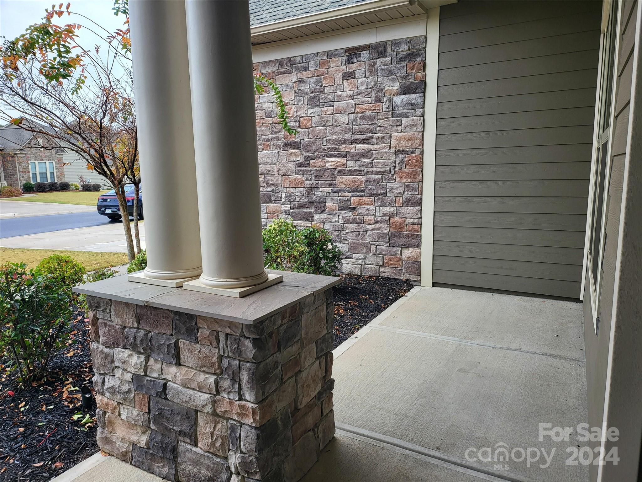 1156 Castle Road Fort Mill, SC 29707 - Photo 4 of 34 a view of a door and brick walls