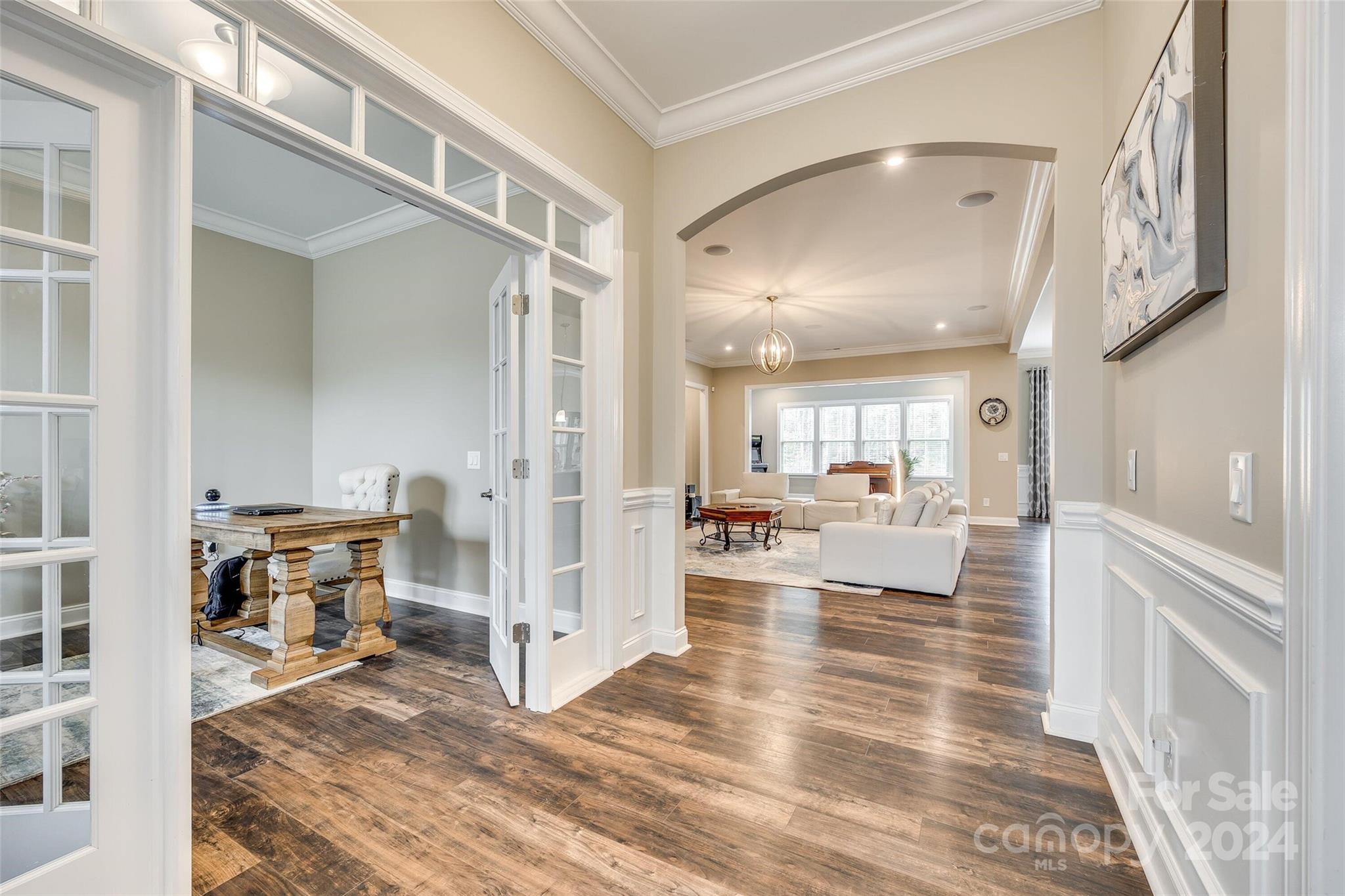 1156 Castle Road Fort Mill, SC 29707 - Photo 8 of 34 a living room with furniture and a wooden floor