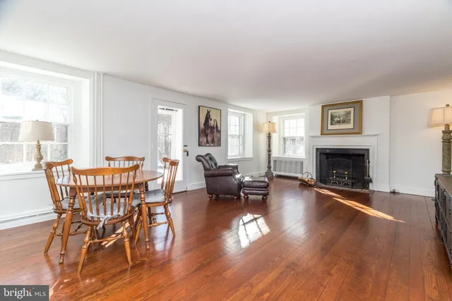 a kitchen with stainless steel appliances granite countertop a sink and a stove top oven