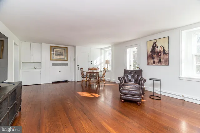 a kitchen with stainless steel appliances granite countertop a sink and a window