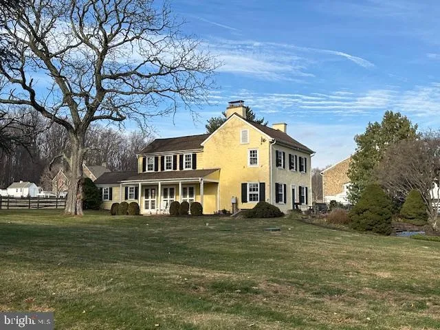 a view of a tables and chairs in a patio