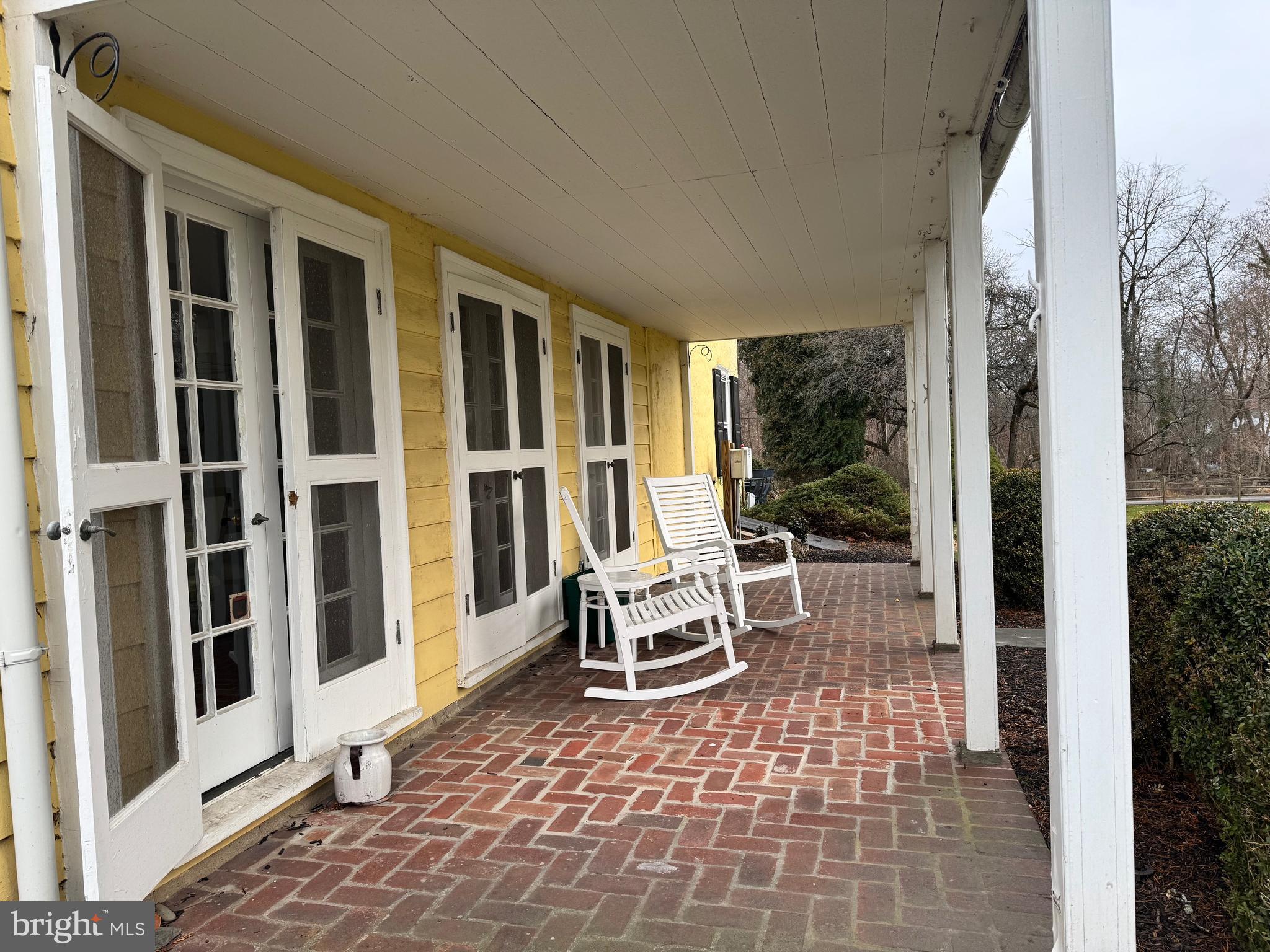 481 West Skippack Pike Blue Bell, PA 19422 - Photo 9 of 11 a view of a patio with table and chairs and wooden floor