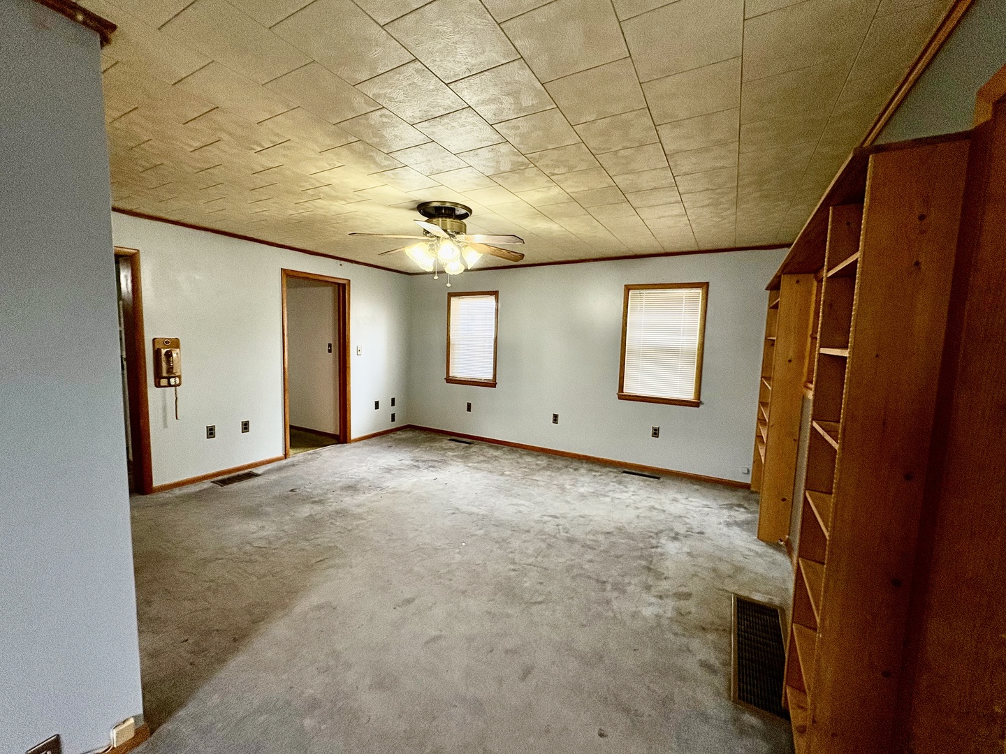 1022 1st Avenue Rochelle, IL 61068 - Photo 11 of 31 a view of a livingroom with window and closet area