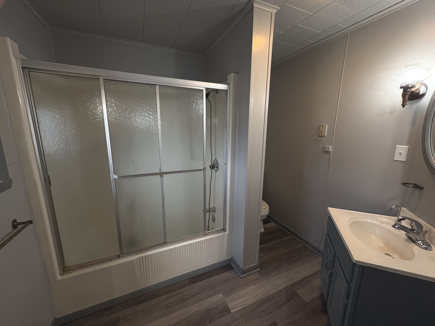 1022 1st Avenue Rochelle, IL 61068 - Photo 21 of 31 a bathroom with a sink toilet and shower