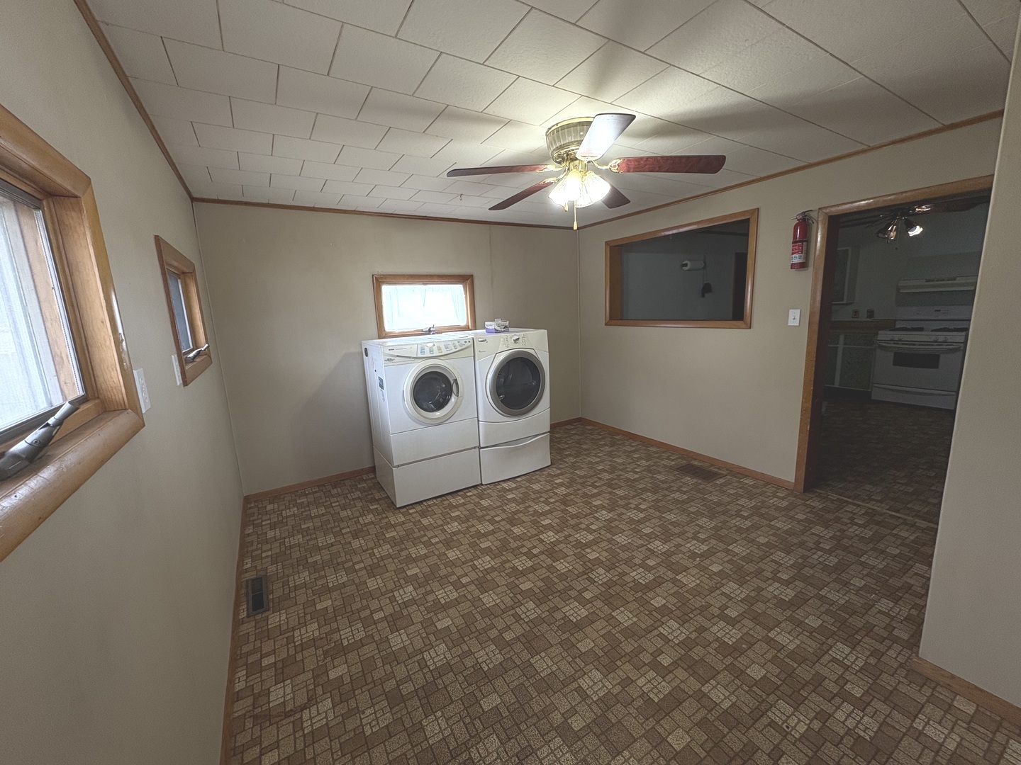 1022 1st Avenue Rochelle, IL 61068 - Photo 3 of 31 a view of a livingroom with a chandelier fan and furniture