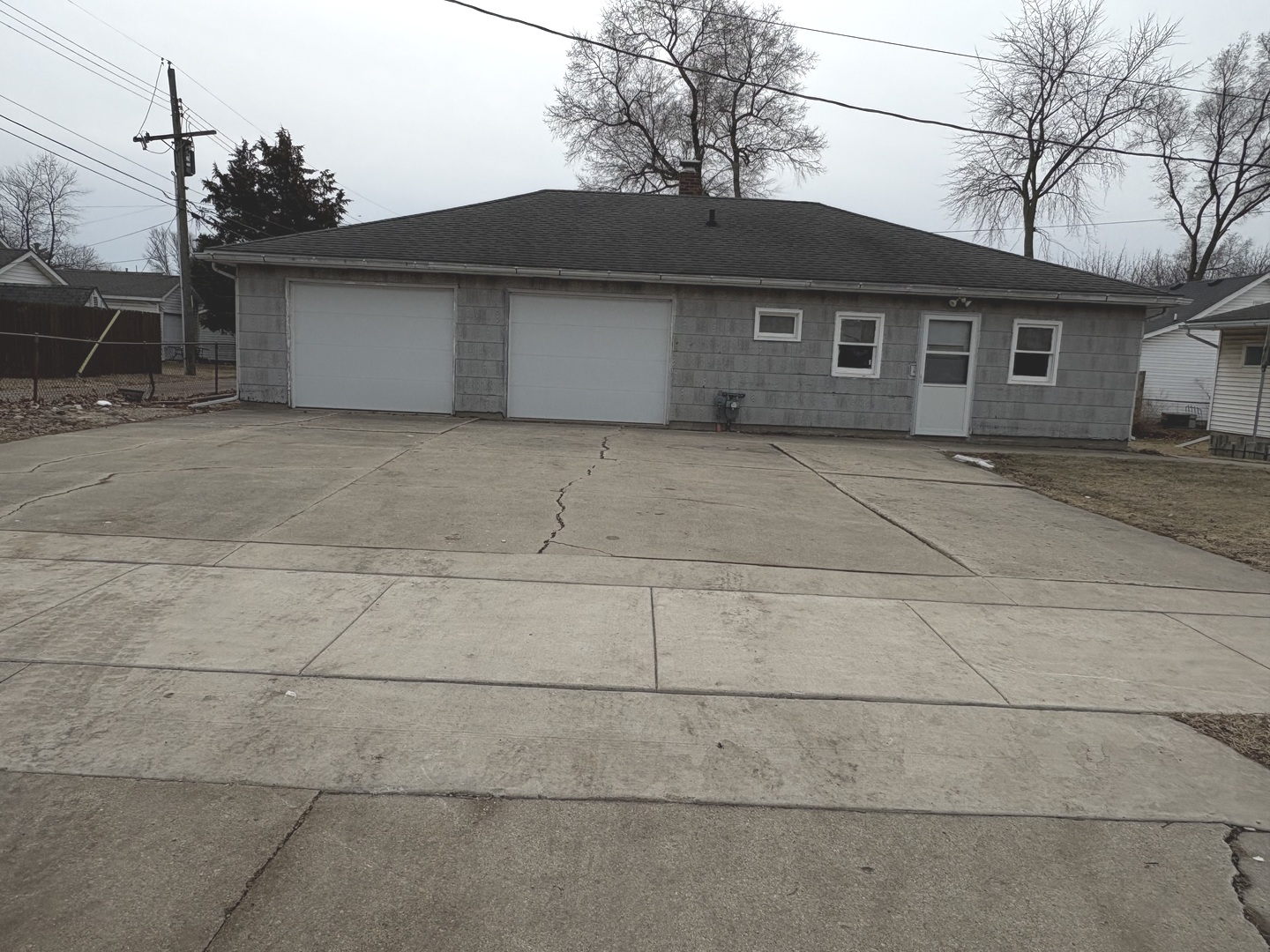 1022 1st Avenue Rochelle, IL 61068 - Photo 31 of 31 a front view of a house with garage