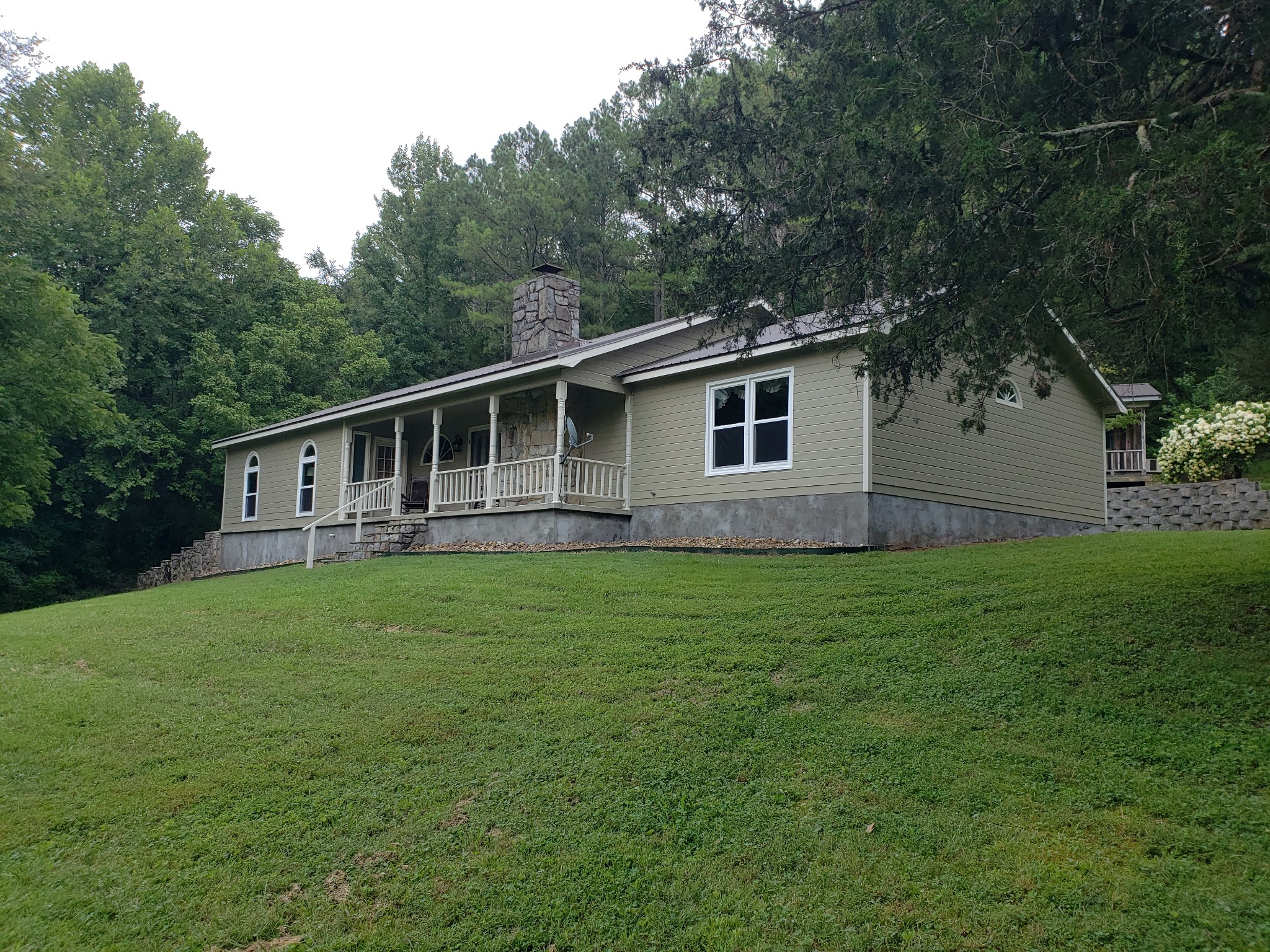 a house view with a garden space