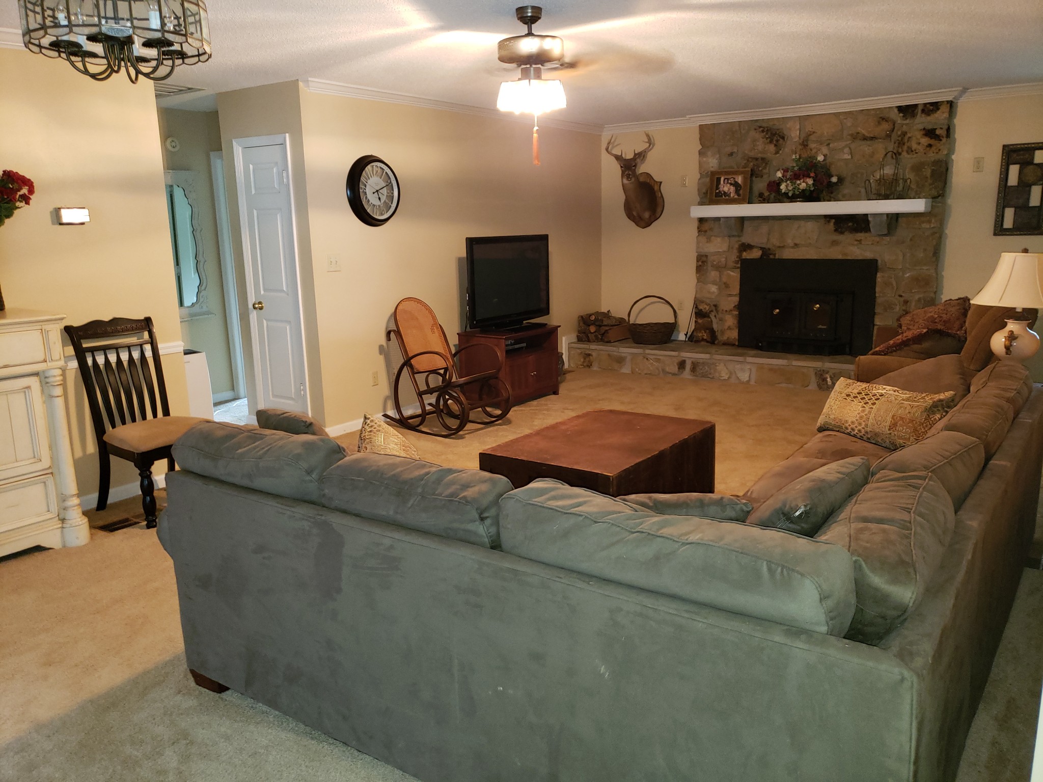 55 Short Creek Road Dellrose, TN 38453 - Photo 18 of 34 a living room with furniture and a fireplace