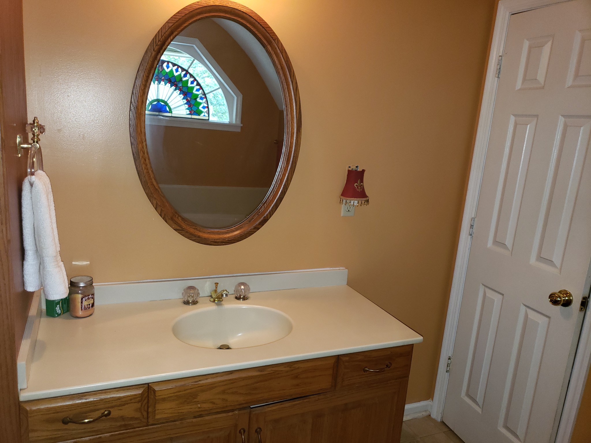 55 Short Creek Road Dellrose, TN 38453 - Photo 19 of 34 a bathroom with a sink and a mirror