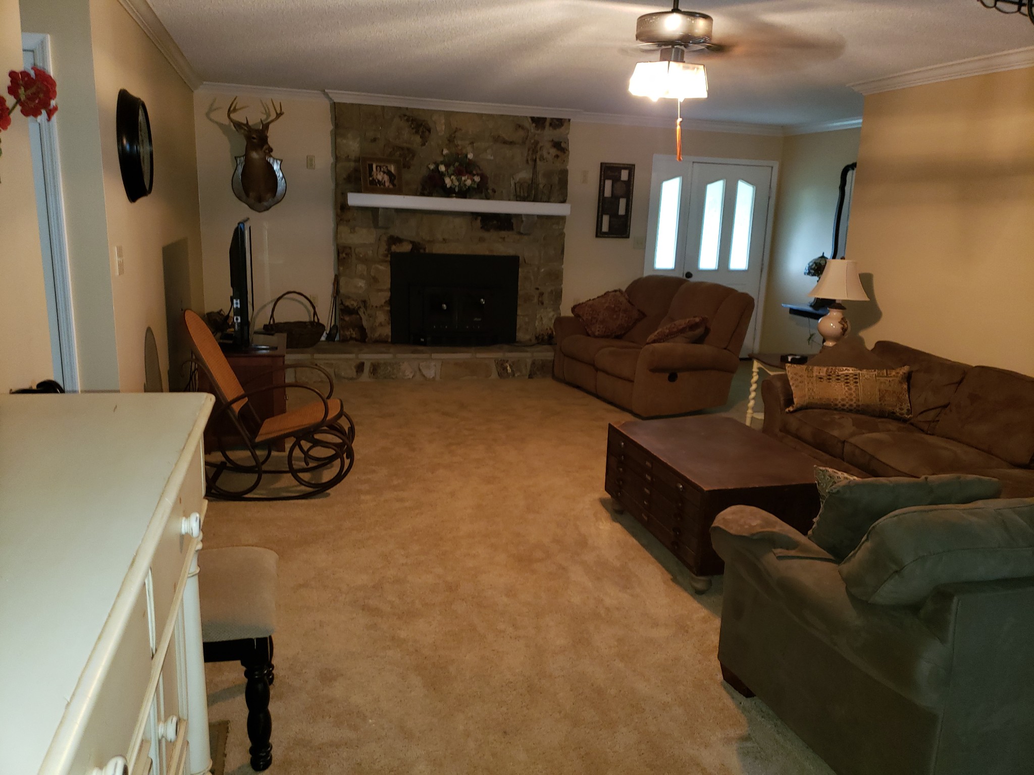 55 Short Creek Road Dellrose, TN 38453 - Photo 20 of 34 a living room with furniture and a fireplace