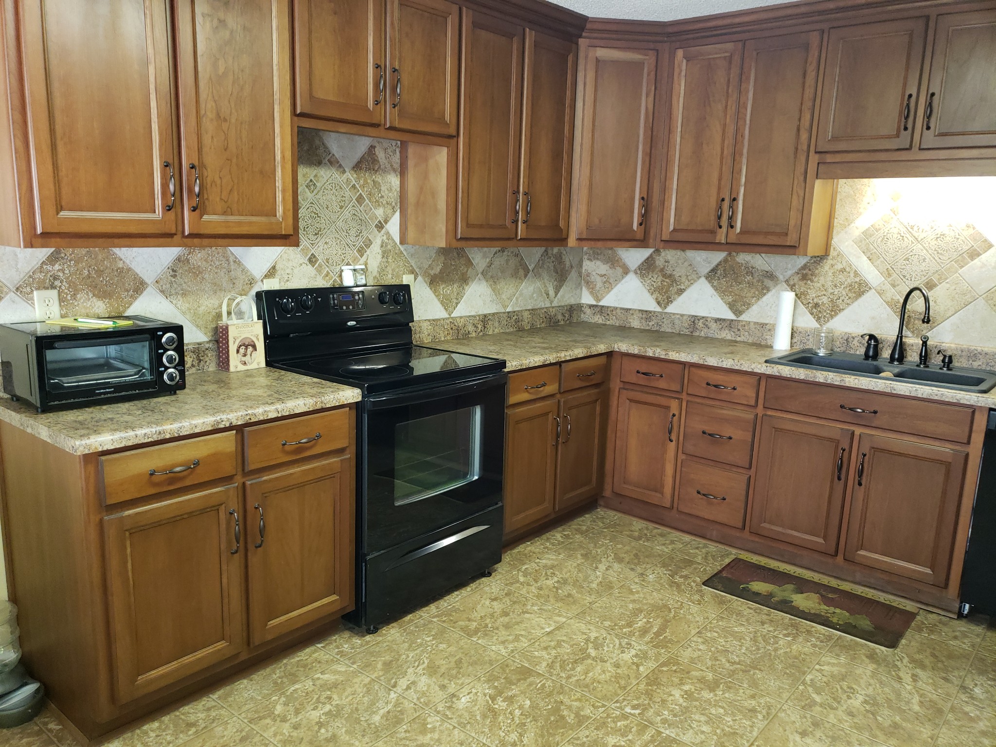 55 Short Creek Road Dellrose, TN 38453 - Photo 9 of 34 a kitchen with sink cabinets and window