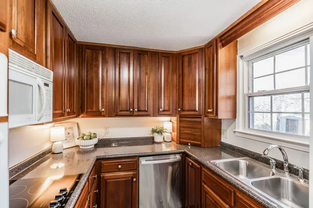 a view of a bathroom with wooden floor