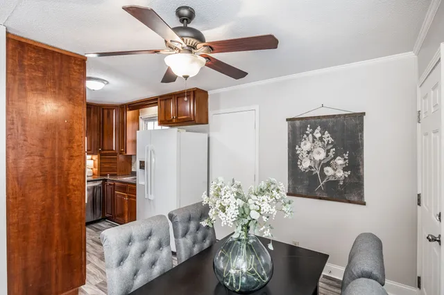 a kitchen that has a sink and a stove in it