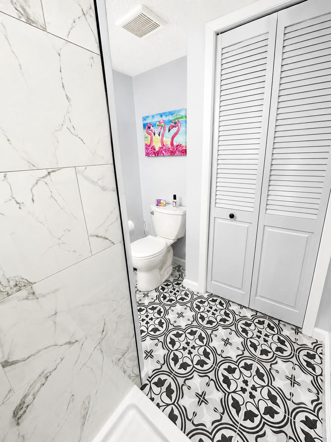 1 Farmcrest Court Silver Spring, MD 20905 - Photo 35 of 61 Designer tiles in the lower-level bathroom.
