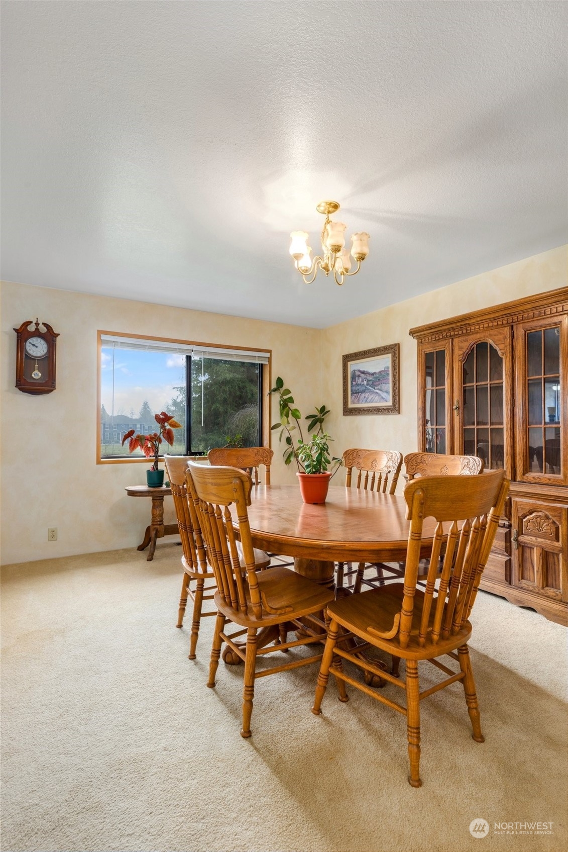20615 Brown Road Monroe, WA 98272 - Photo 23 of 36 a view of a dining room with furniture a rug and wooden floor