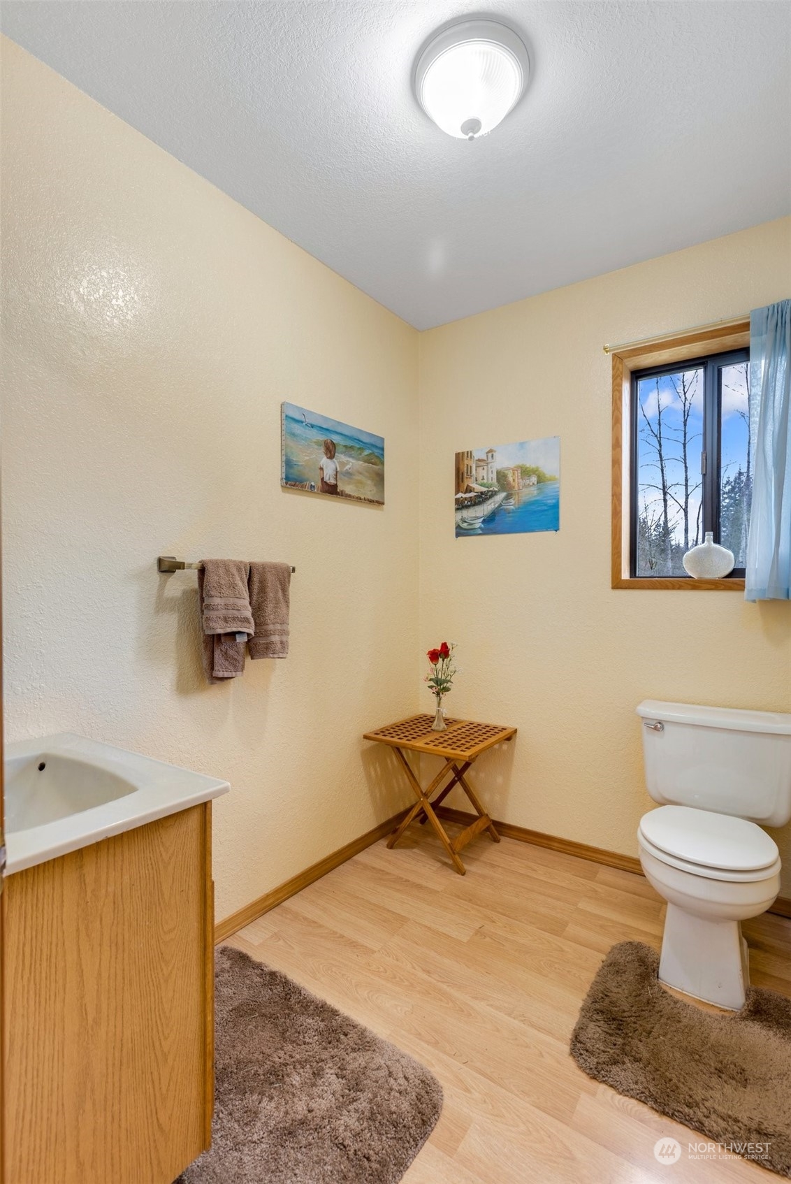 20615 Brown Road Monroe, WA 98272 - Photo 29 of 36 a bathroom with a toilet sink and mirror