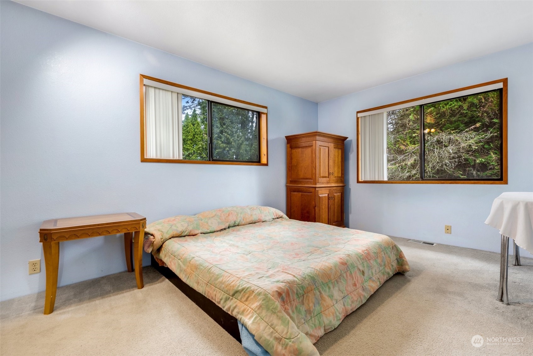 20615 Brown Road Monroe, WA 98272 - Photo 32 of 36 a bedroom with a bed and a painting on the wall
