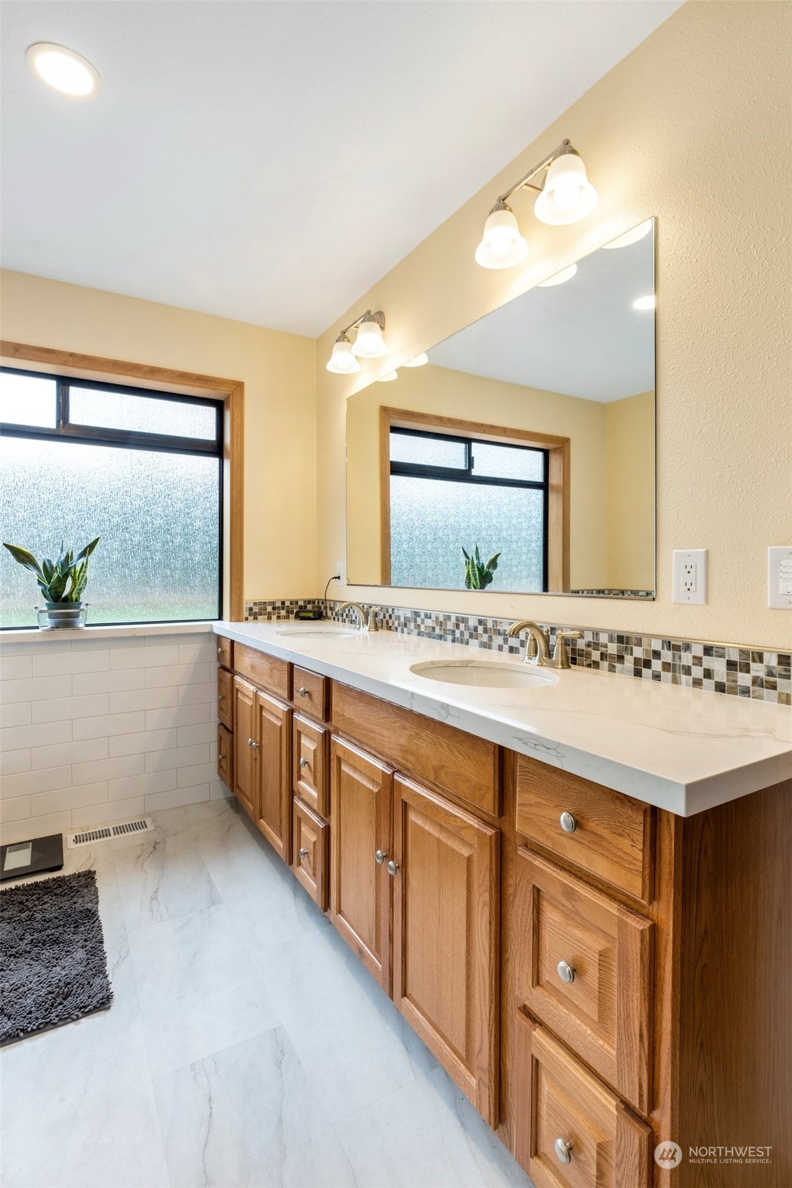 20615 Brown Road Monroe, WA 98272 - Photo 35 of 36 a bathroom with a granite countertop sink and a mirror