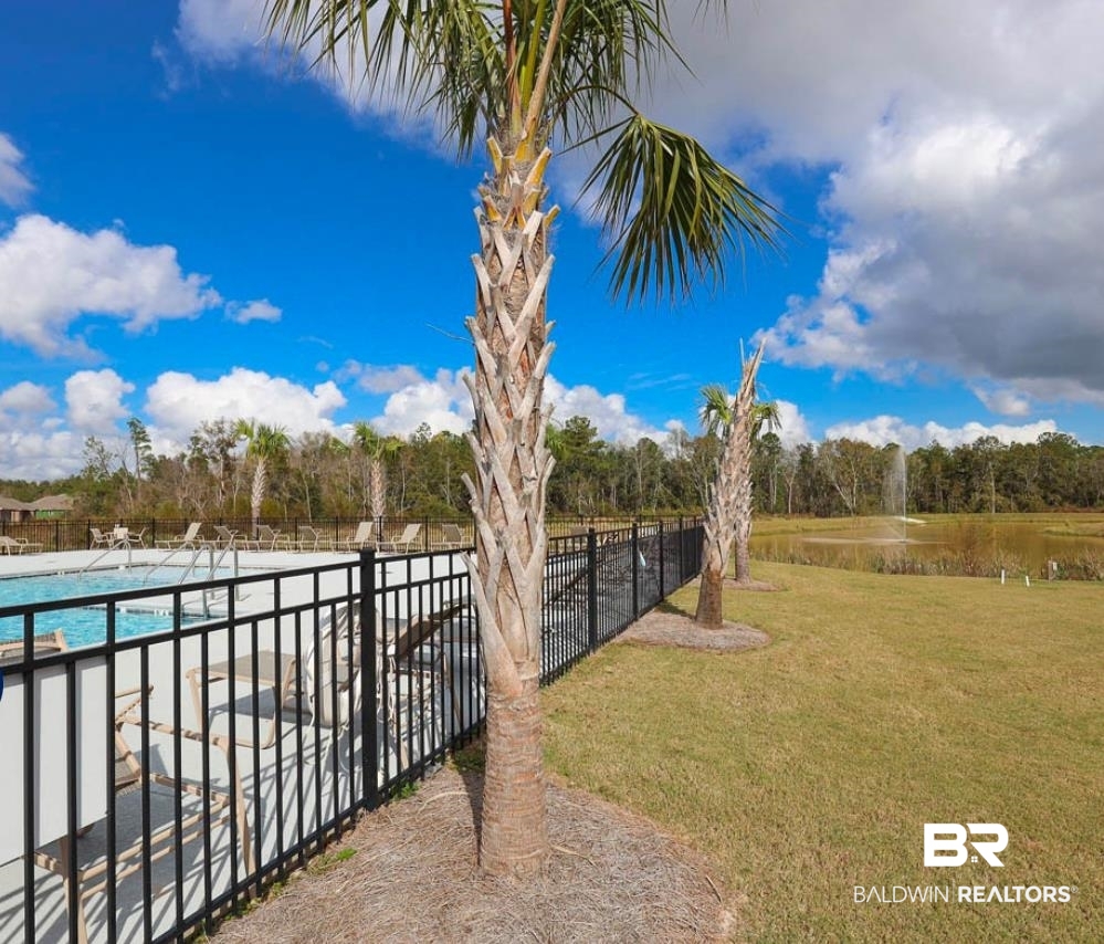 23548 Travis Stock Street, Unit 50 Foley, AL 36535 - Photo 27 of 30 View of yard with a community pool