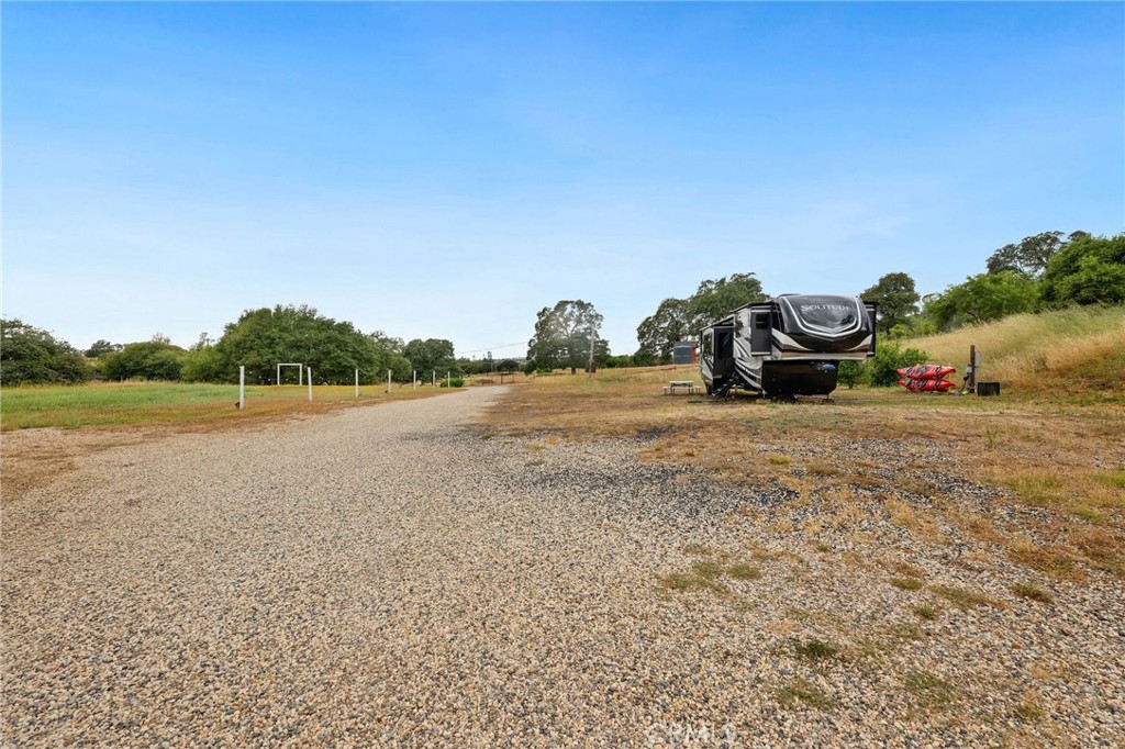 2728 Pentz Road Oroville, CA 95965 - Photo 44 of 52 a view of a field with some trees in the background