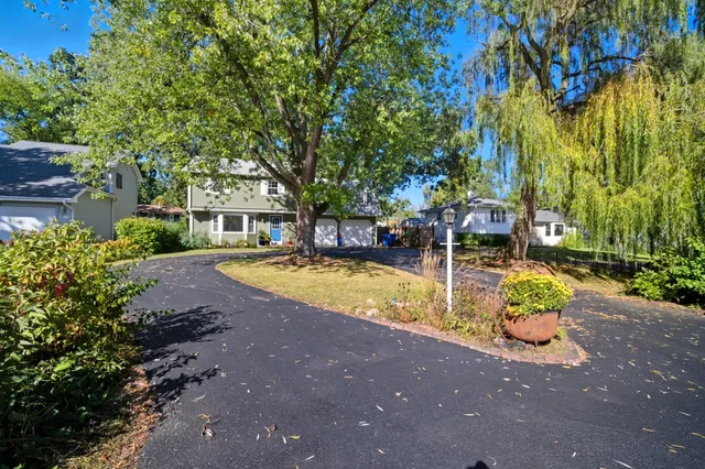 a view of a house with swimming pool
