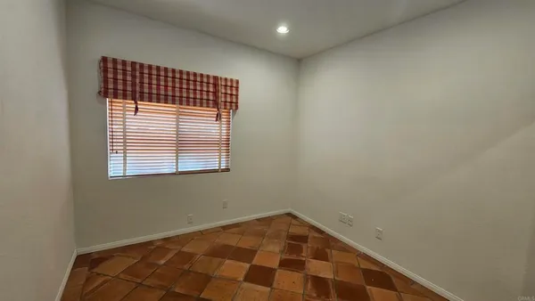 a view of a room with a window
