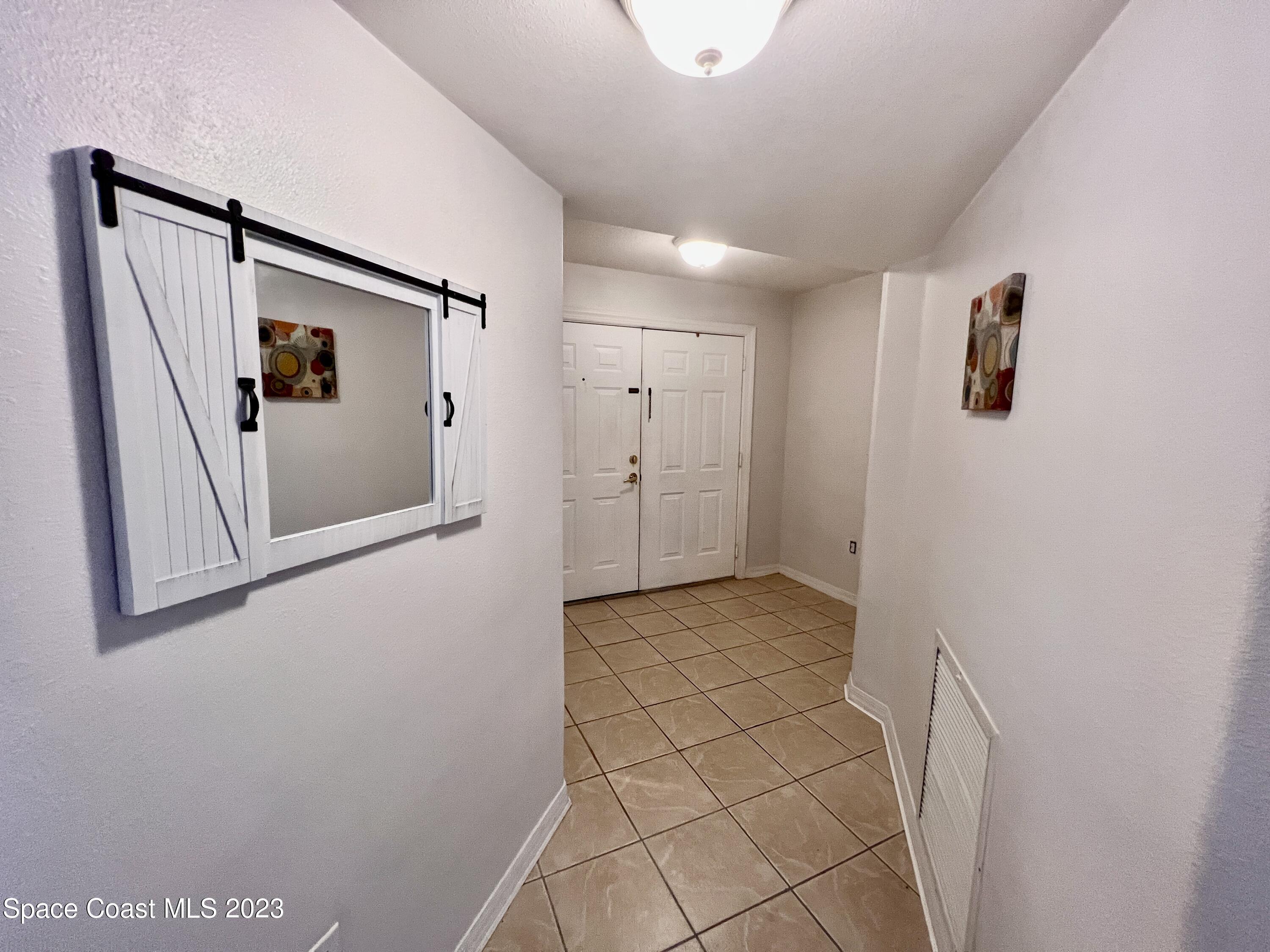 800 Del Rio Way, Unit 402 Merritt Island, FL 32953 - Photo 14 of 24 a view of an empty room
