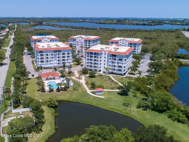 an aerial view of river residential house with outdoor space and seating