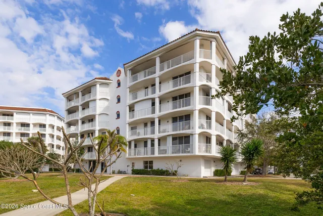 a view of a swimming pool with an outdoor seating