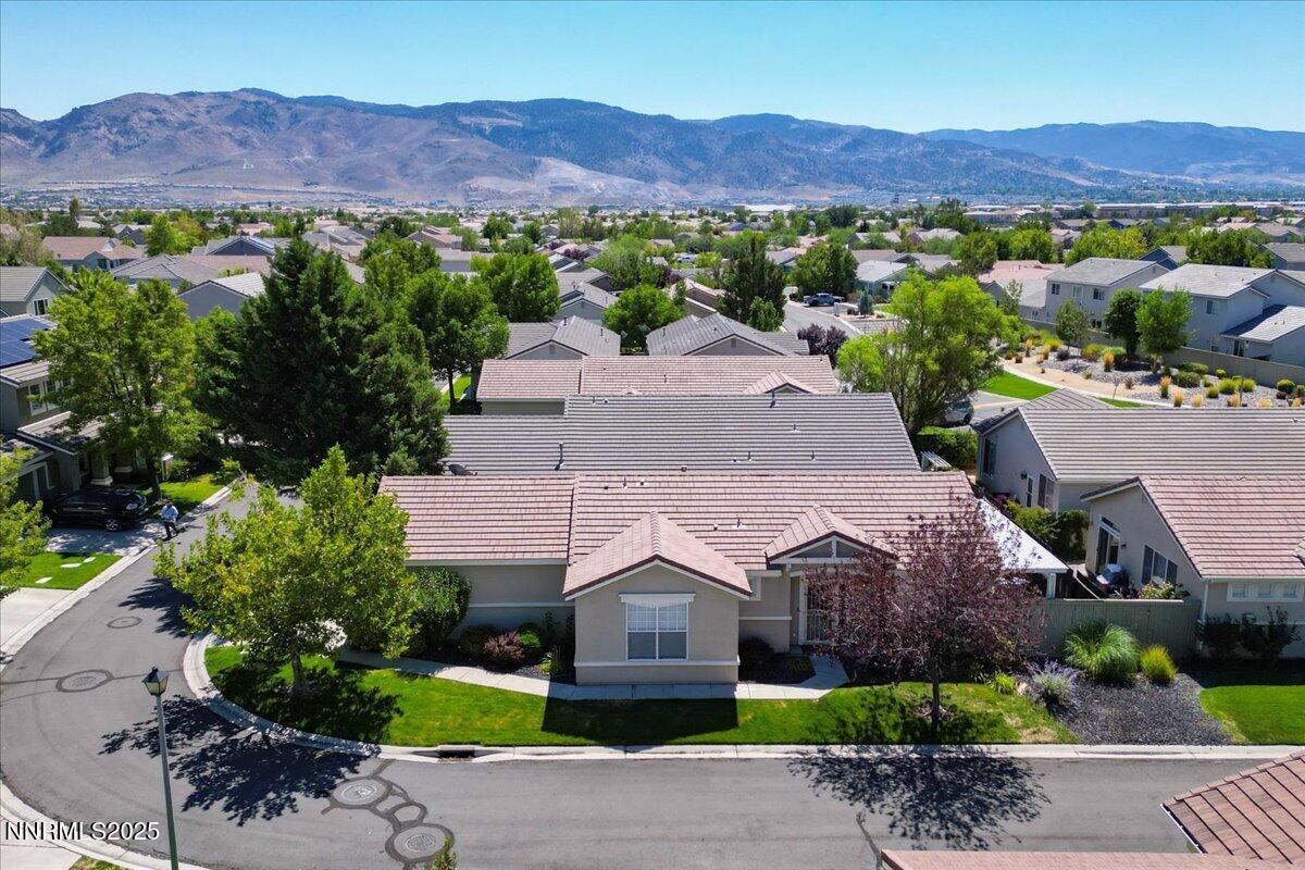 1612 Mountain Lane Reno, NV 89521 - Photo 1 of 36 an aerial view of a house and a mountain