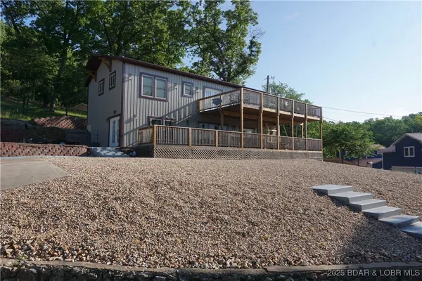 $645,000 | 401 Putt N Bay Drive, Sunrise Beach, MO 65079