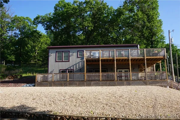 $645,000 | 401 Putt N Bay Drive, Sunrise Beach, MO 65079