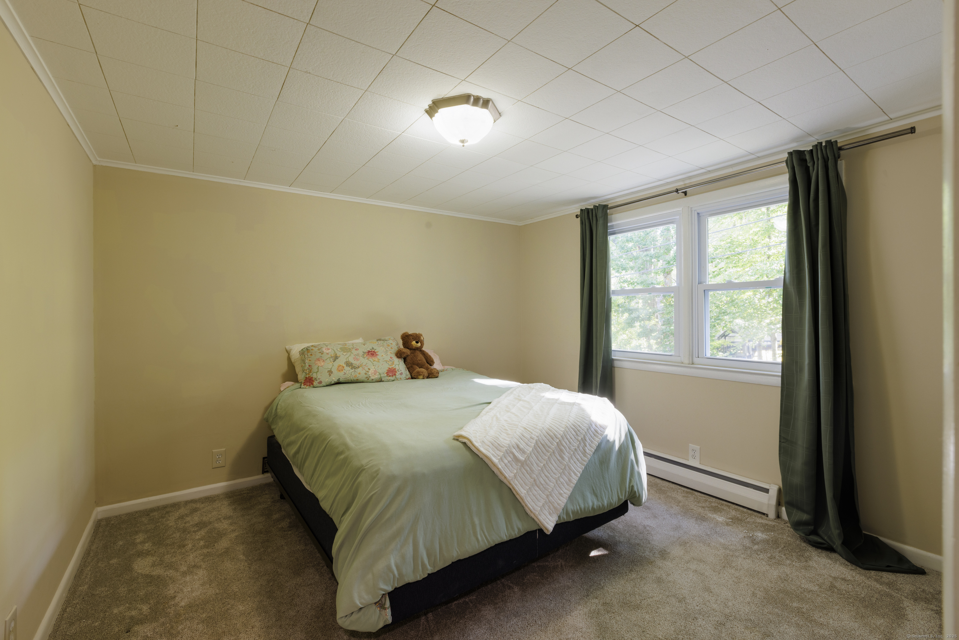 239 A Rockledge Road Lyme, CT 06371 - Photo 18 of 30 a bed sitting in a room next to a window