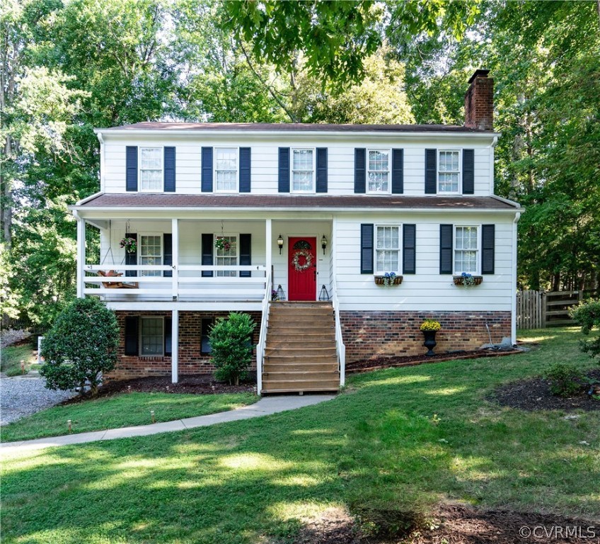 11330 Poplar Ridge Road Chesterfield, VA 23236 - Photo 1 of 32 front view of a house with a yard