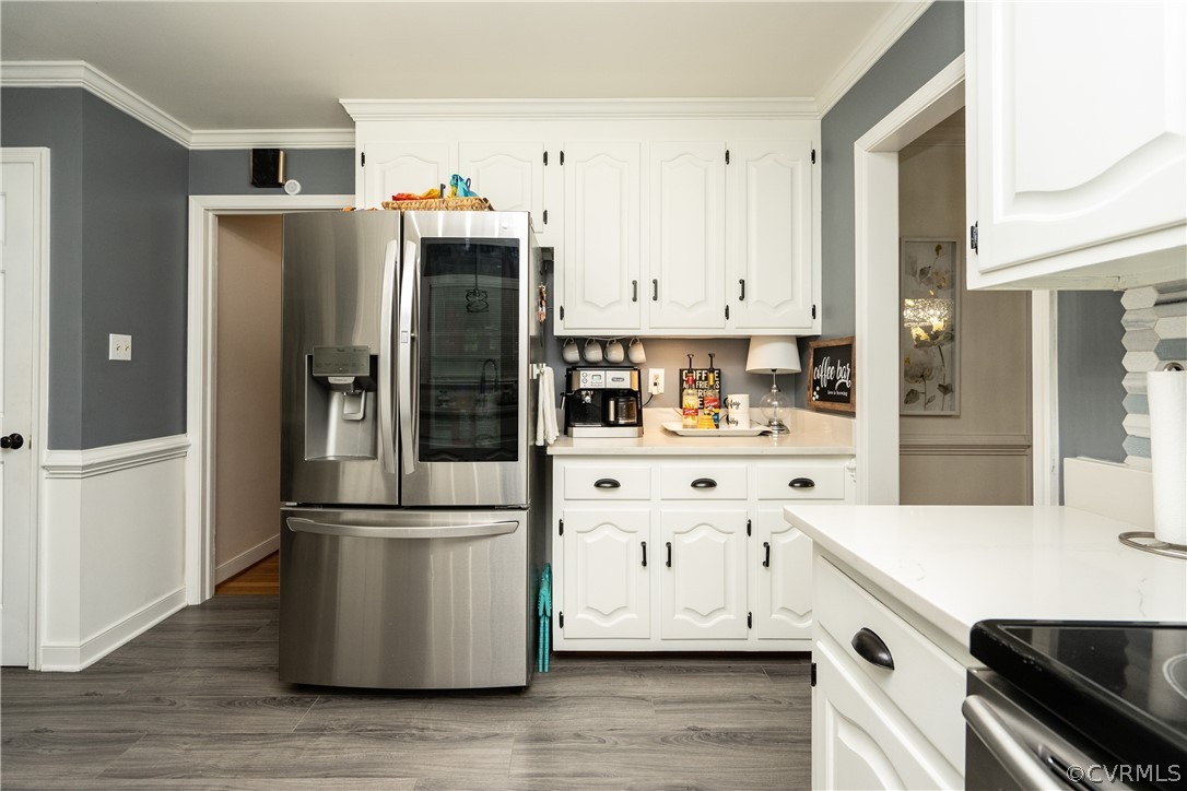 11330 Poplar Ridge Road Chesterfield, VA 23236 - Photo 11 of 32 a kitchen with stainless steel appliances a refrigerator sink and cabinets