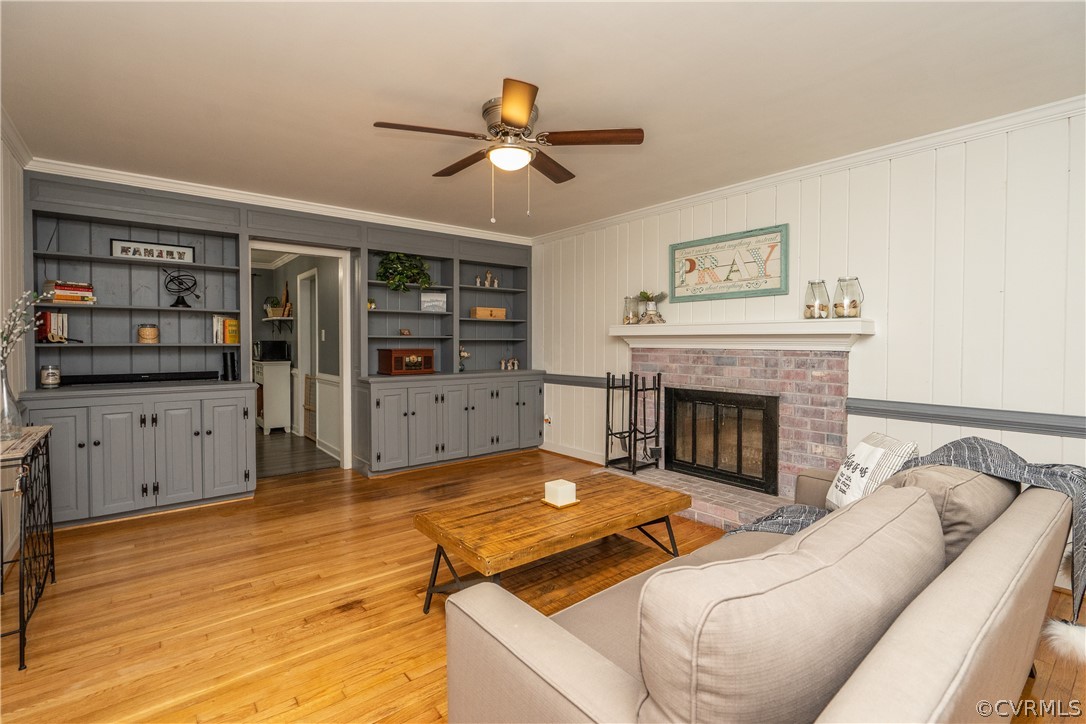 11330 Poplar Ridge Road Chesterfield, VA 23236 - Photo 13 of 32 a living room with furniture and a fireplace