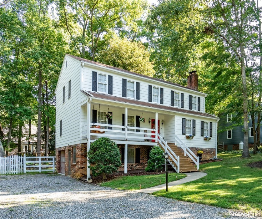 11330 Poplar Ridge Road Chesterfield, VA 23236 - Photo 2 of 32 a front view of a house with a yard