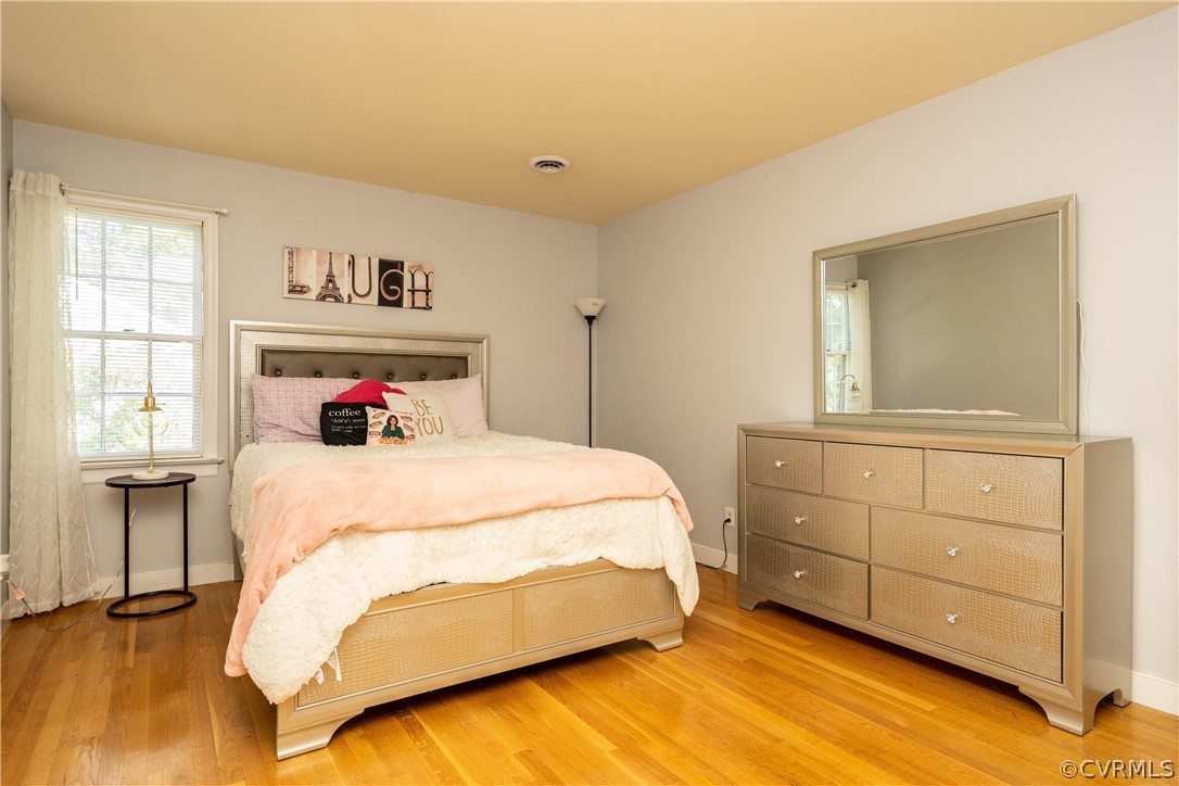 11330 Poplar Ridge Road Chesterfield, VA 23236 - Photo 21 of 32 a bedroom with a bed and a window