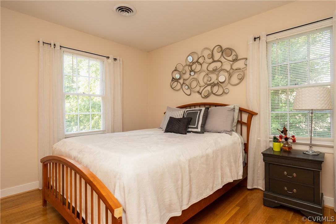 11330 Poplar Ridge Road Chesterfield, VA 23236 - Photo 22 of 32 a bedroom with a bed and window