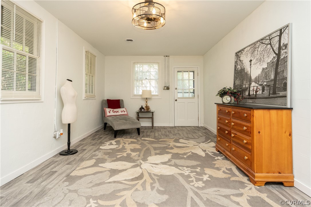 11330 Poplar Ridge Road Chesterfield, VA 23236 - Photo 25 of 32 a living room with furniture and a dresser