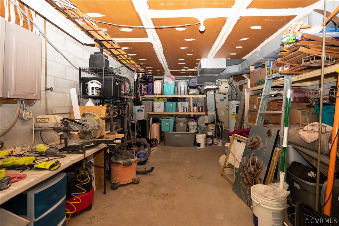 11330 Poplar Ridge Road Chesterfield, VA 23236 - Photo 29 of 32 a view of a storage room with washer and dryer