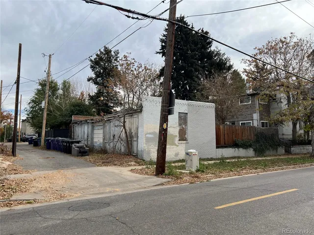a view of a house with a street