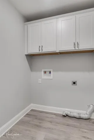 a view of cabinets and wooden floor
