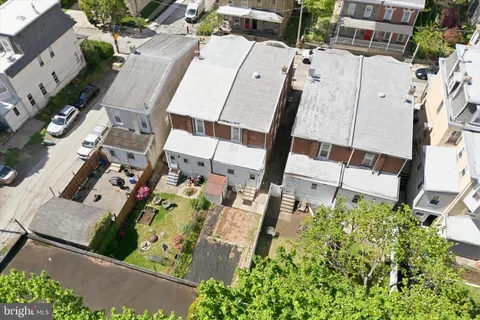 an aerial view of a city with lots of residential buildings