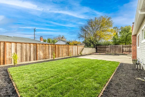 a view of a backyard with a garden