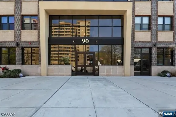 a view of a building with a potted plant