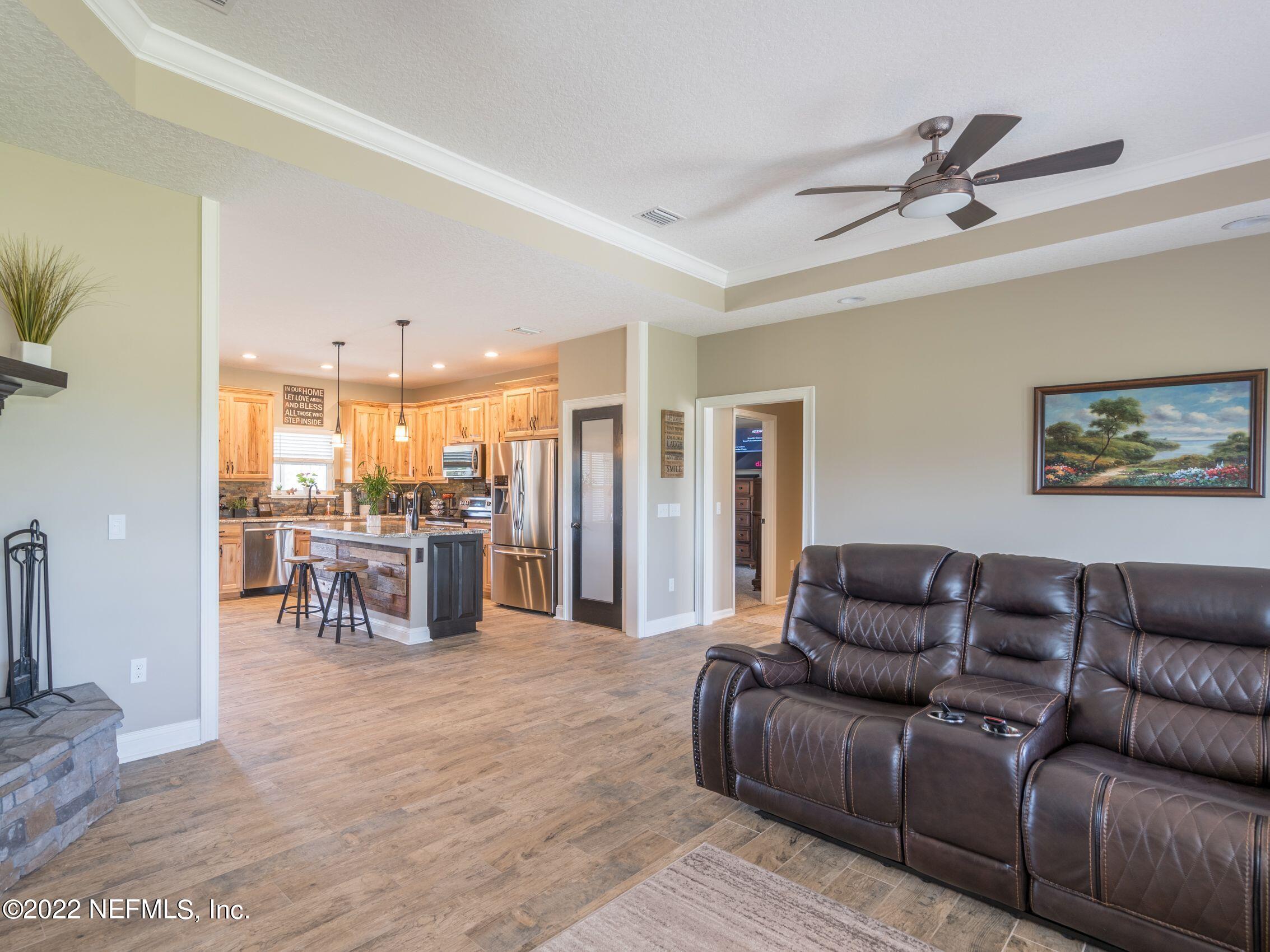 54476 Wildlife Way Callahan, FL 32011 - Photo 13 of 35 a living room with furniture and a table